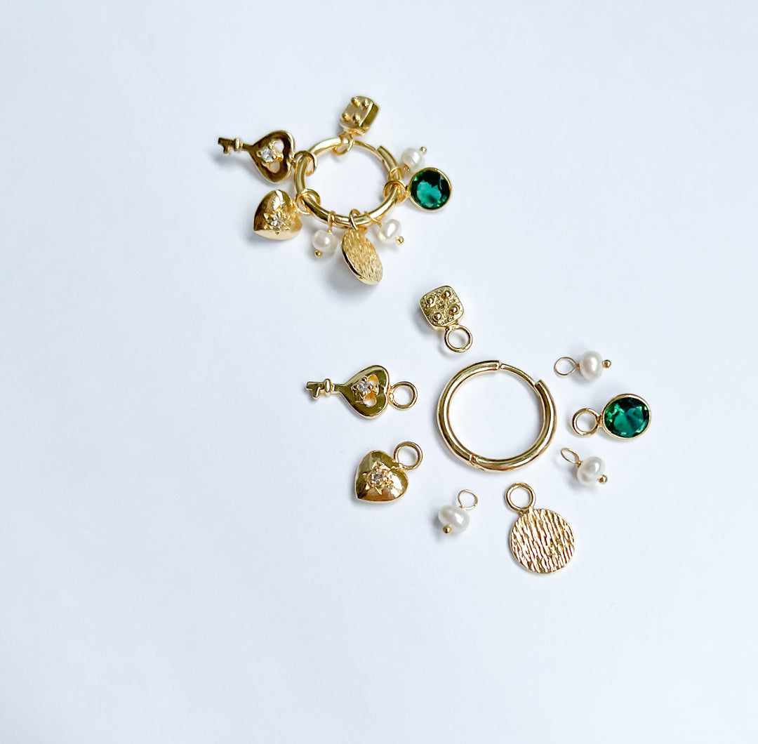 Musette korvarenkaat irrotettavilla riipuksilla