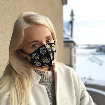 Face mask with floral decorations